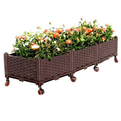 Il PVC di plastica sollevato multifunzionale delle piantatrici del giardino ha alzato il letto del giardino sulle macchine per colata continua