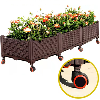 Il PVC di plastica sollevato multifunzionale delle piantatrici del giardino ha alzato il letto del giardino sulle macchine per colata continua
