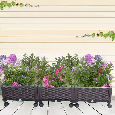 Il PVC di plastica sollevato multifunzionale delle piantatrici del giardino ha alzato il letto del giardino sulle macchine per colata continua